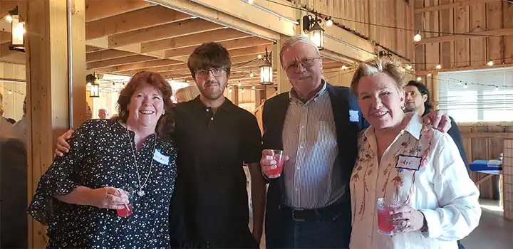 3 attendees with Sally Fallon Morell at celebration of life Geoffrey C Morell